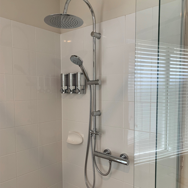 How Do I Clean Thermostatic Shower? , How to clean a showerhead, With Deluxe Dual Hose Column (Sold Separately)